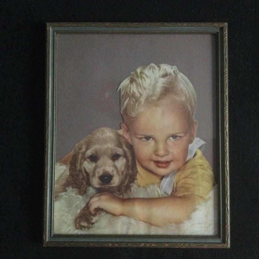 Small vintage print boy and dog with a vintage frame wall decor
